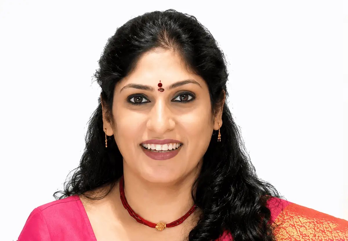 Customer profile of Sridevi, mango farmer from Chittoor, managing a 30-acre mango plantation.