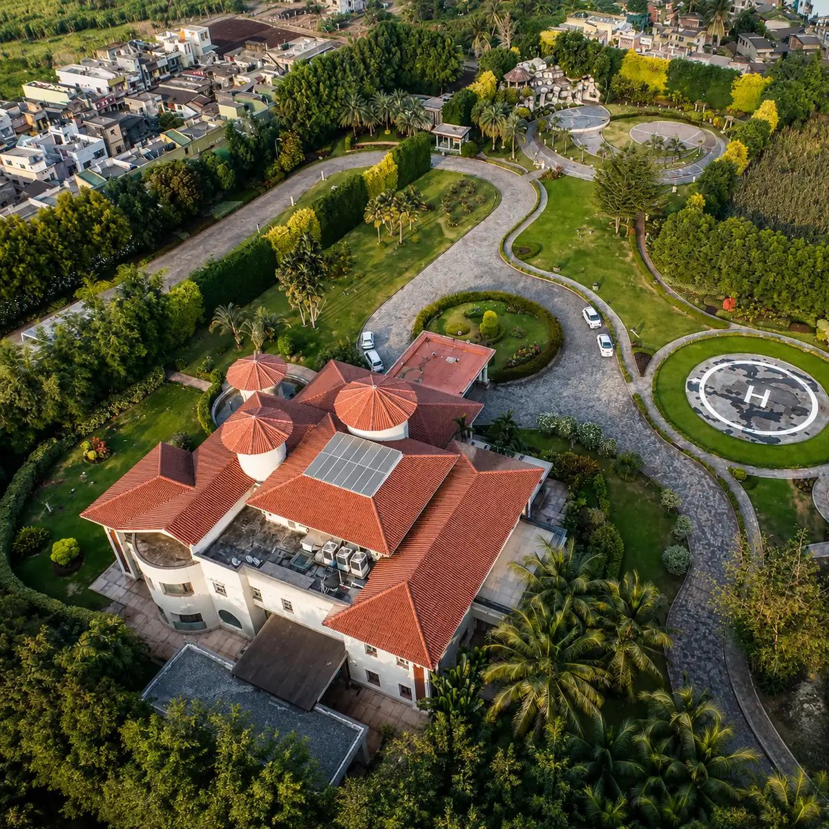 Luxury eco-retreat featuring landscaped roads, gardens, solar integration, and sustainable residential planning.